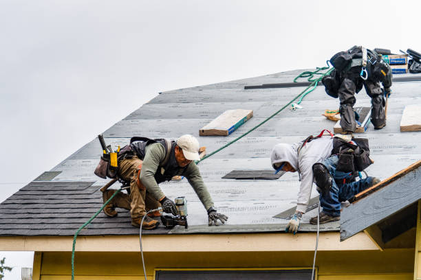 Professional Gutter Installation technician working in Howard, OH